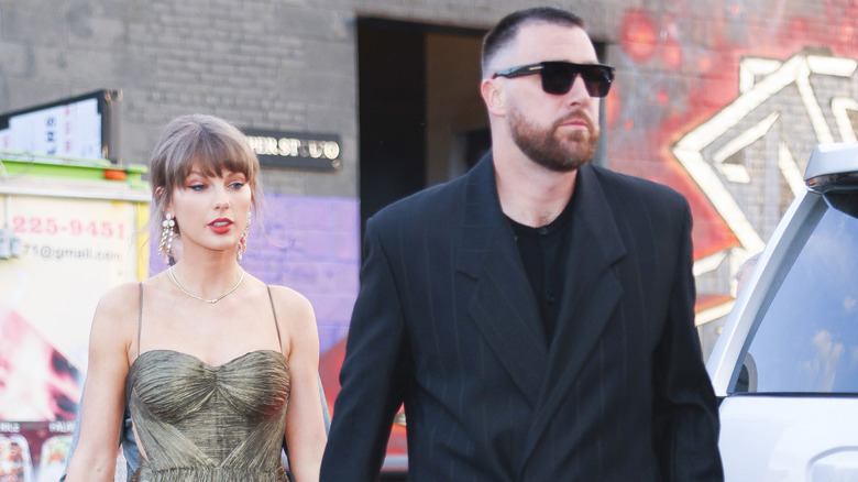 Taylor Swift and Travis Kelce walking together
