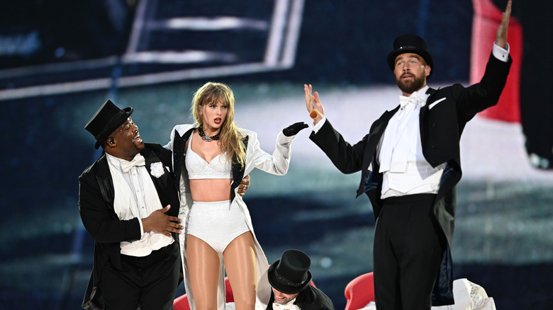 Taylor Swift and Travis Kelce on stage at The Eras Tour in London.