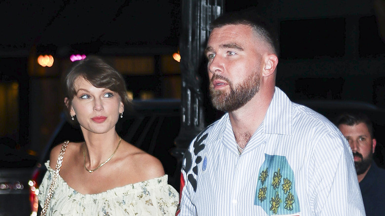 Taylor Swift and Travis Kelce walking together