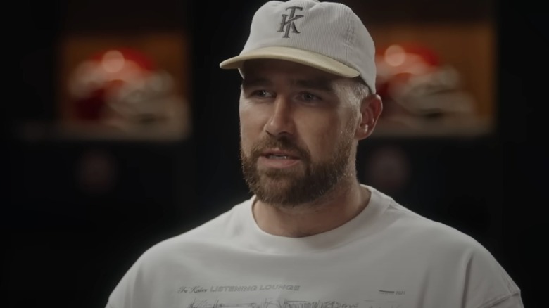 Travis Kelce wearing a baseball cap