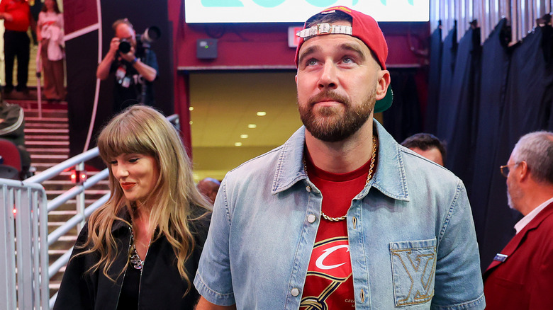 Travis Kelce and Taylor Swift arriving for a Knicks game in Cleveland