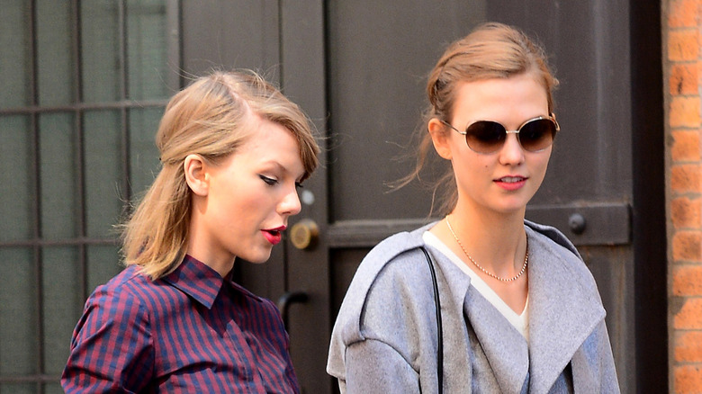Taylor Swift and Karlie Kloss walking together