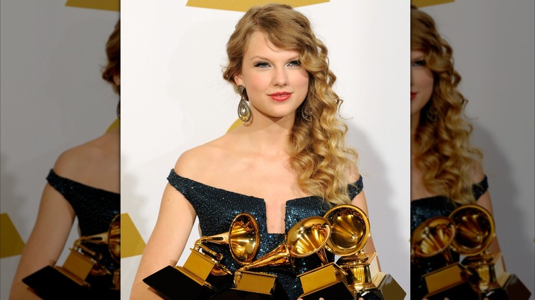 Taylor Swift holds her Grammy wins at the 2010 ceremony