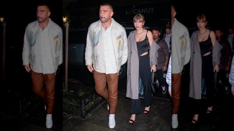 Taylor Swift and Travis Kelce walking together on a date night