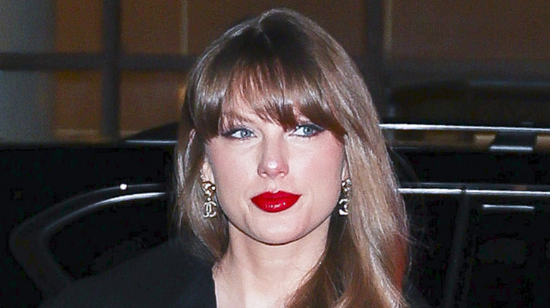 Taylor Swift looking lost in thought