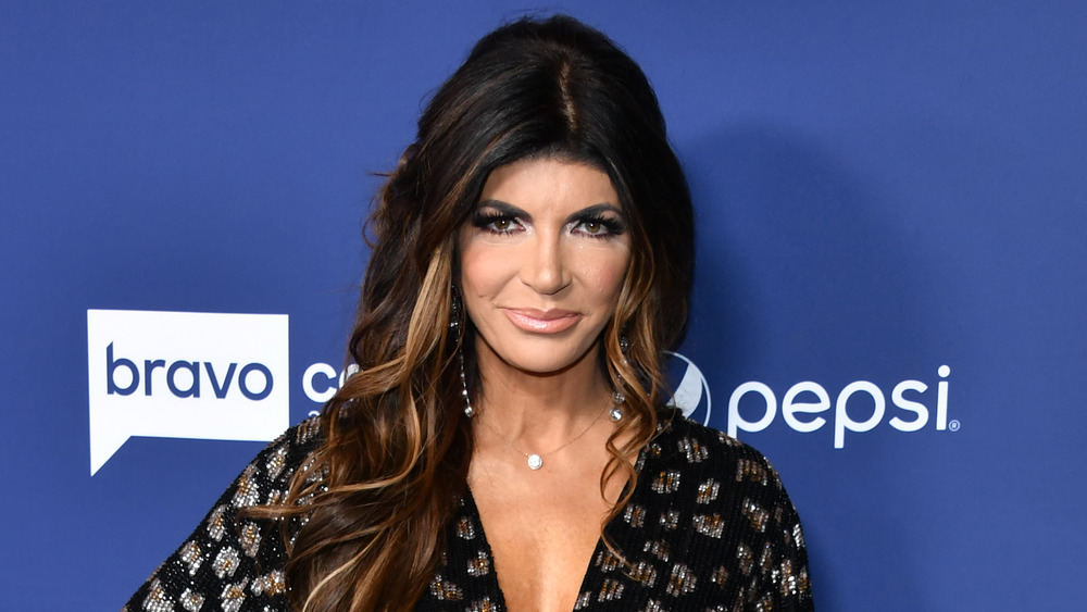 Teresa Giudice posing with small smile