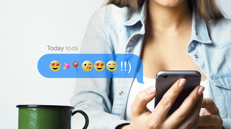 woman texting with emojis