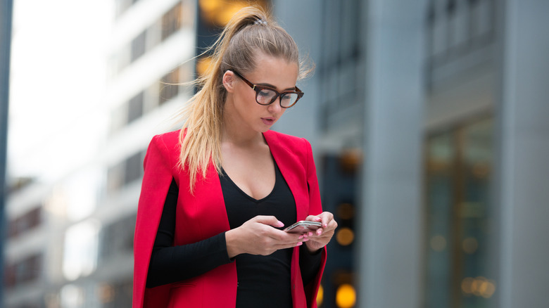 woman texting on cellphone