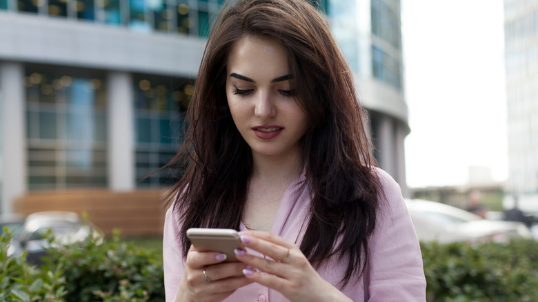Woman using cell phone