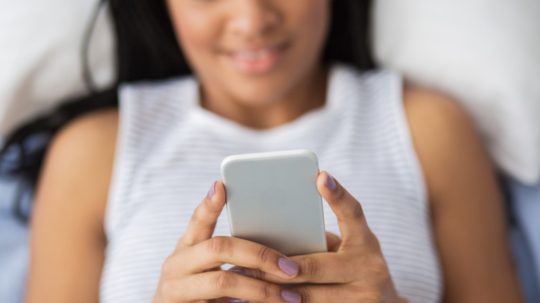 closeup of woman texting