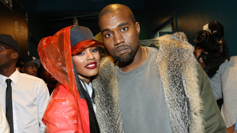 Teyana Taylor & Kanye West attend a music even in 2014