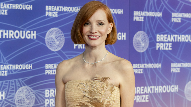 Jessica Chastain with a short bob smiling