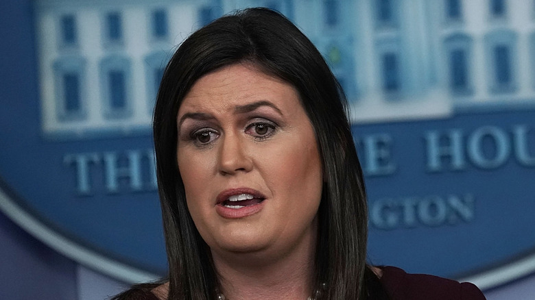 Sarah Huckabee Sanders giving White House press briefing in 2018