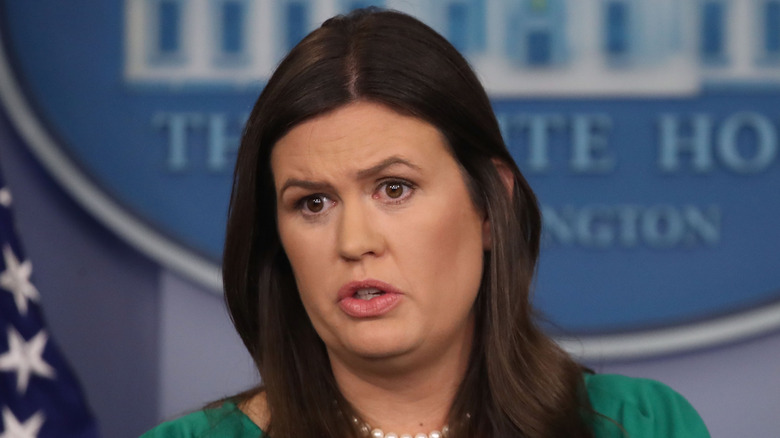 Sarah Huckabee Sanders giving White House press briefing in 2018
