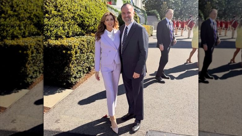 Erin and Dan Scavino posing