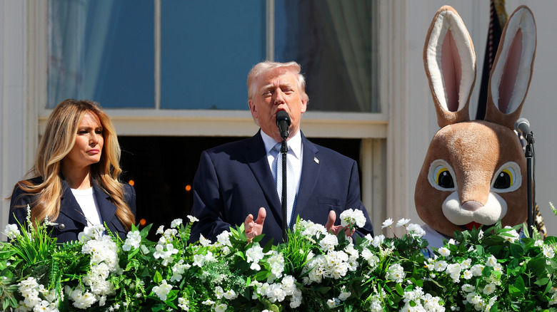 Donald Trump speaking next to Melania Trump and the Easter bunny