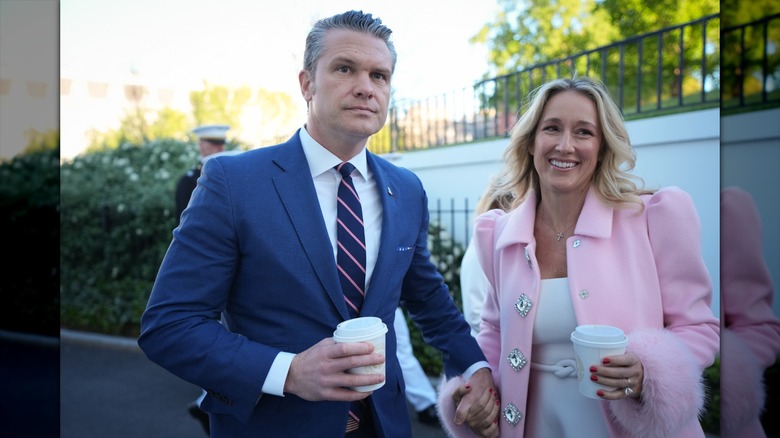 Pete and Jennifer Hegseth holding hands