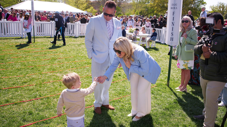 Nicholas Riccio and Karoline Leavitt with their son
