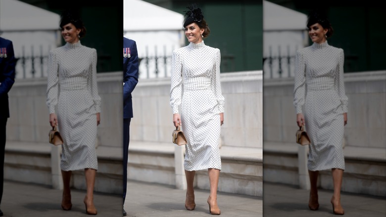 Kate Middleton in a polkadot dress with nude heels and nude handbag
