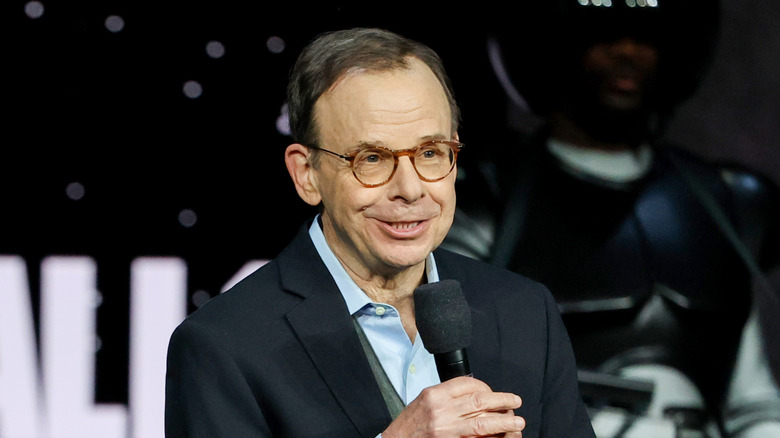 Rick Moranis speaking with microphone