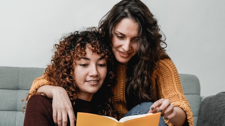 couple looking at a book together