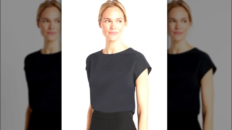 Model wearing black dress t-shirt