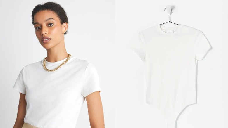 Black model wearing white bodysuit t-shirt