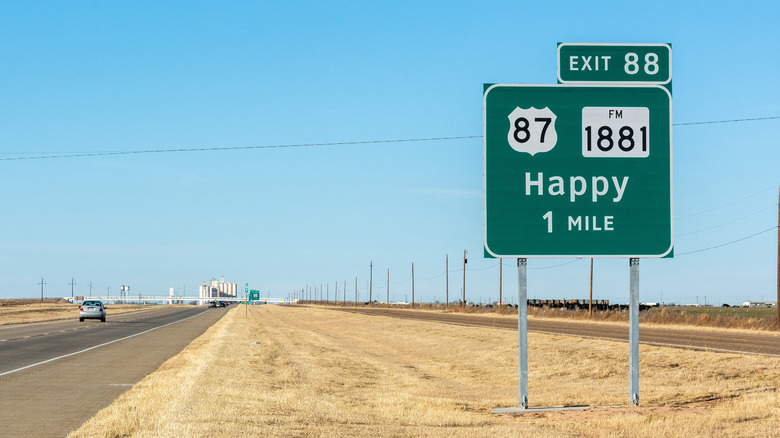 Interstate sign "Happy" by freeway