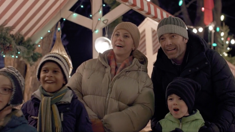 Tim Rozon and Jodie Sweetin in "Merry Swissmas" 