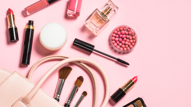 Beauty products on pink background