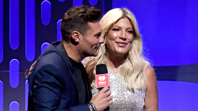Ryan Seacrest and Tori Spelling at an event together