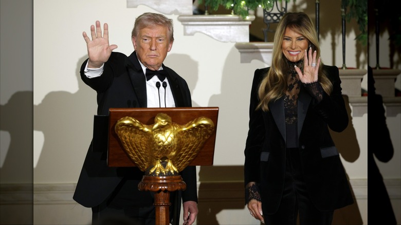 Donald Trump and Melania Trump waving
