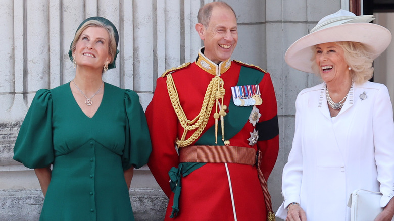 Sophie, Duchess of Edinburgh wearing a green dress, standing with Prince Edward and Queen Camilla