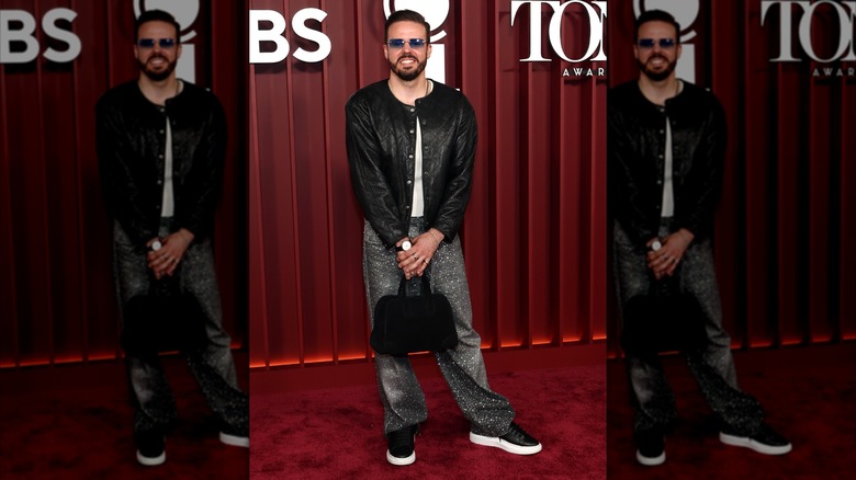 Michael Thurber posing on the 2025 Tony Awards red carpet