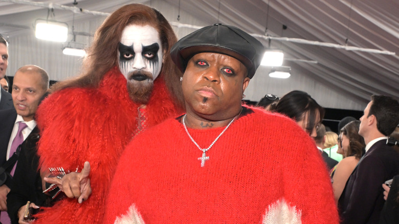 Cee Lo Green wearing red contact lenses and Kingston Callaway with white and black face paint