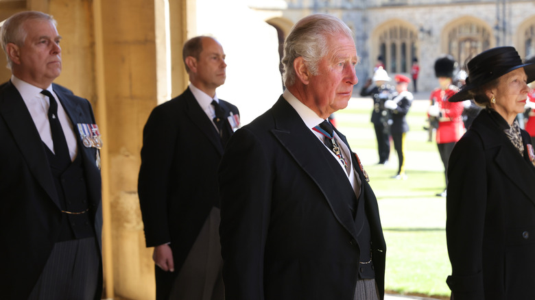 King Charles, Princess Anne, Prince Andrew, Prince Edward dressed in mourning attire