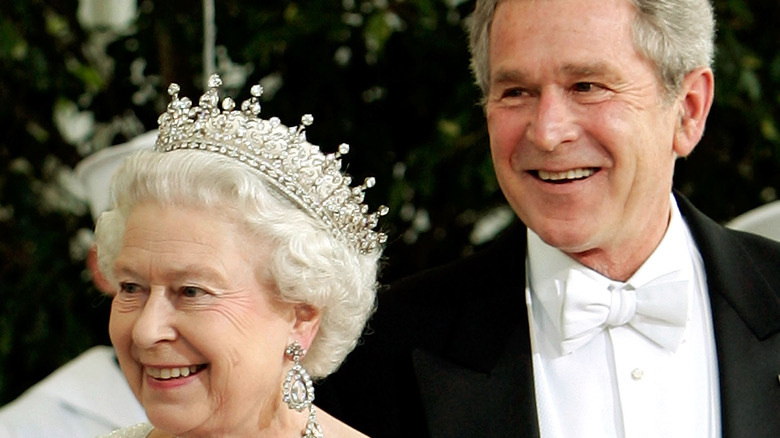 Queen Elizabeth II and President George W Bush smiling