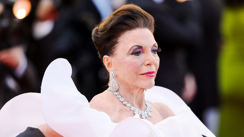 Joan Collins in white at the 2026 Cannes Film Festival