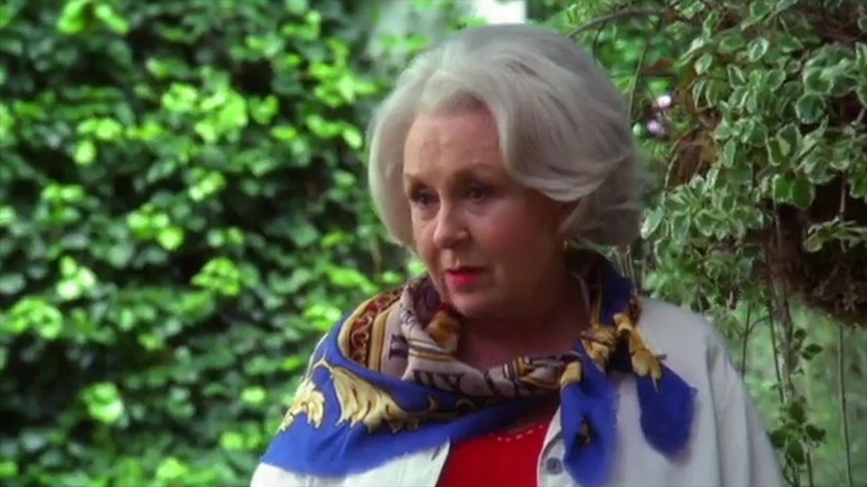 Doris Roberts with a blue scarf tied around her neck in "A Time to Remember"