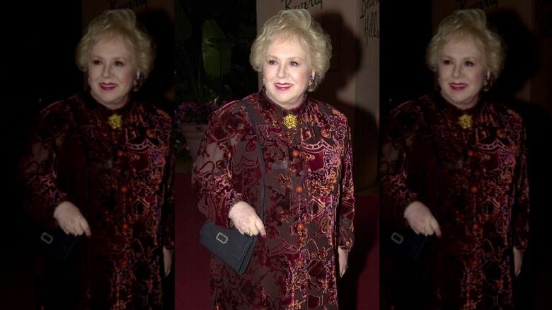 Doris Roberts in 2003 with a purse over her shoulder