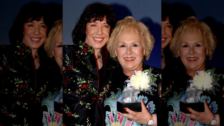 Doris Roberts and Lily Tomlin posing together