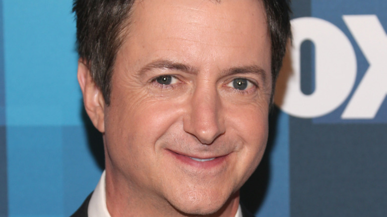 Brian Dunkleman grinning at a FOX event