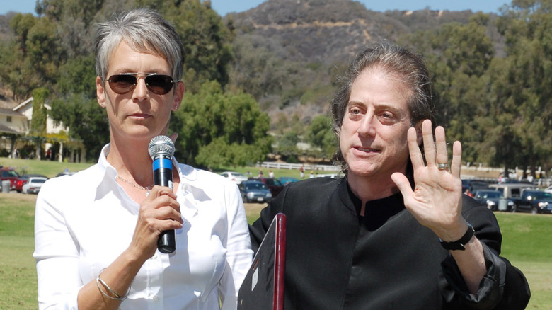 Jamie Lee Curtis and Richard Lewis standing next to each other outdoors in 2007