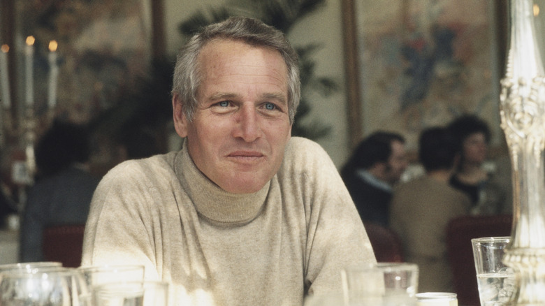 Paul Newman (1925 - 2008) attending a luncheon to promote his new film 'Slap Shot' in New York, February 24th 1977.