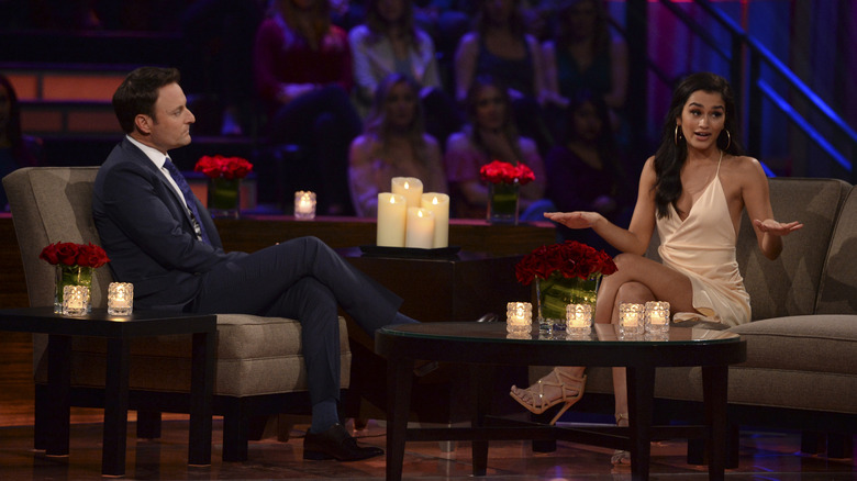 Bachelor franchise host Chris Harrison speaks with Taylor Nolan at Women Tell All