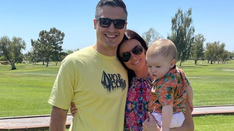 Courtney Robertson with her fiancé and son