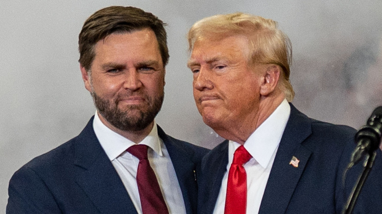 JD Vance and Donald Trump at a podium