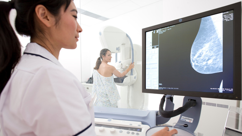 Doctor looking at mammogram on computer