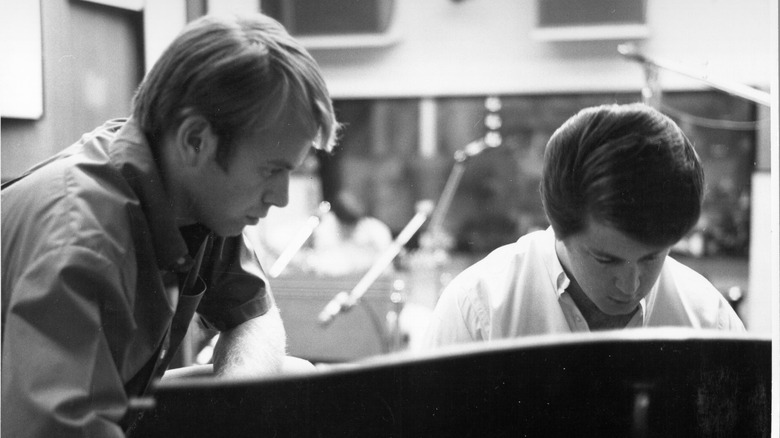 Al Jardine and Brian Wilson working at a piano