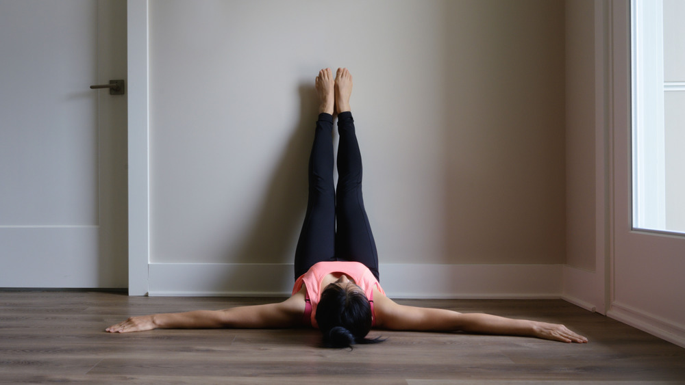 Woman stretching legs